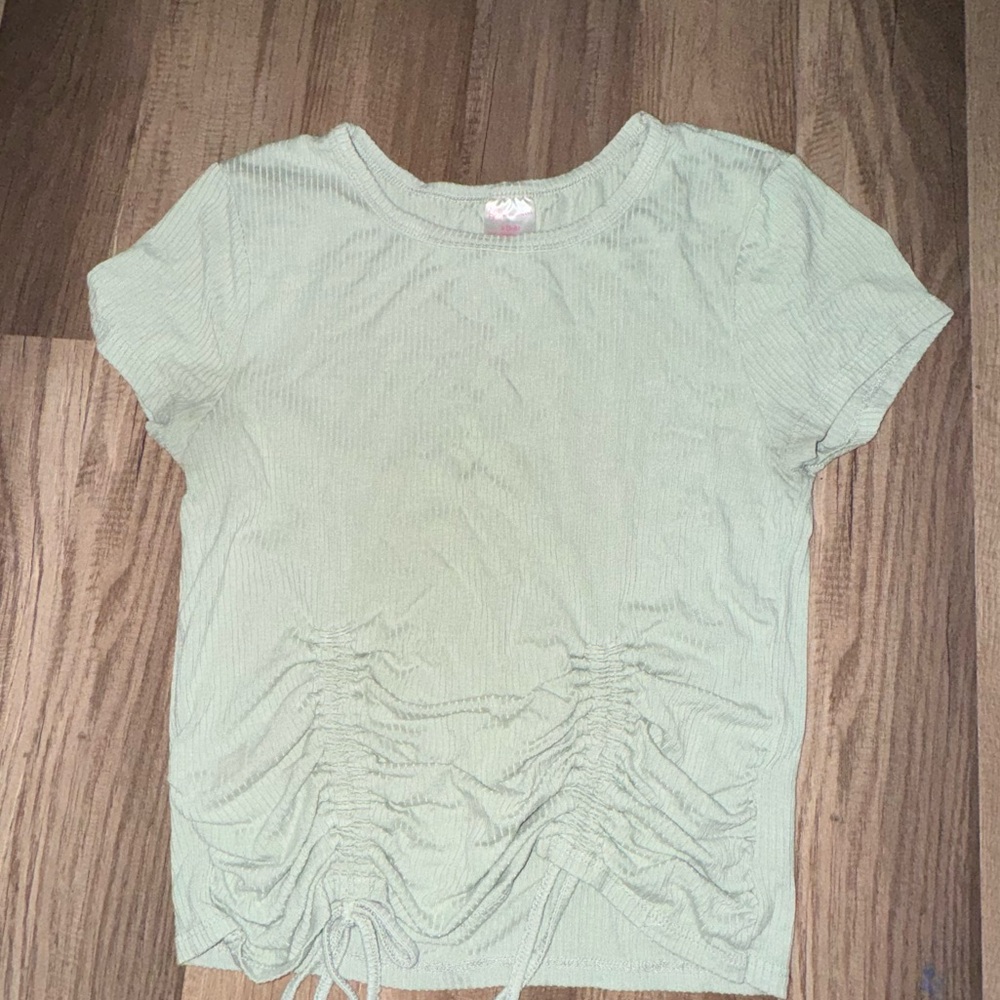 Green crop top.